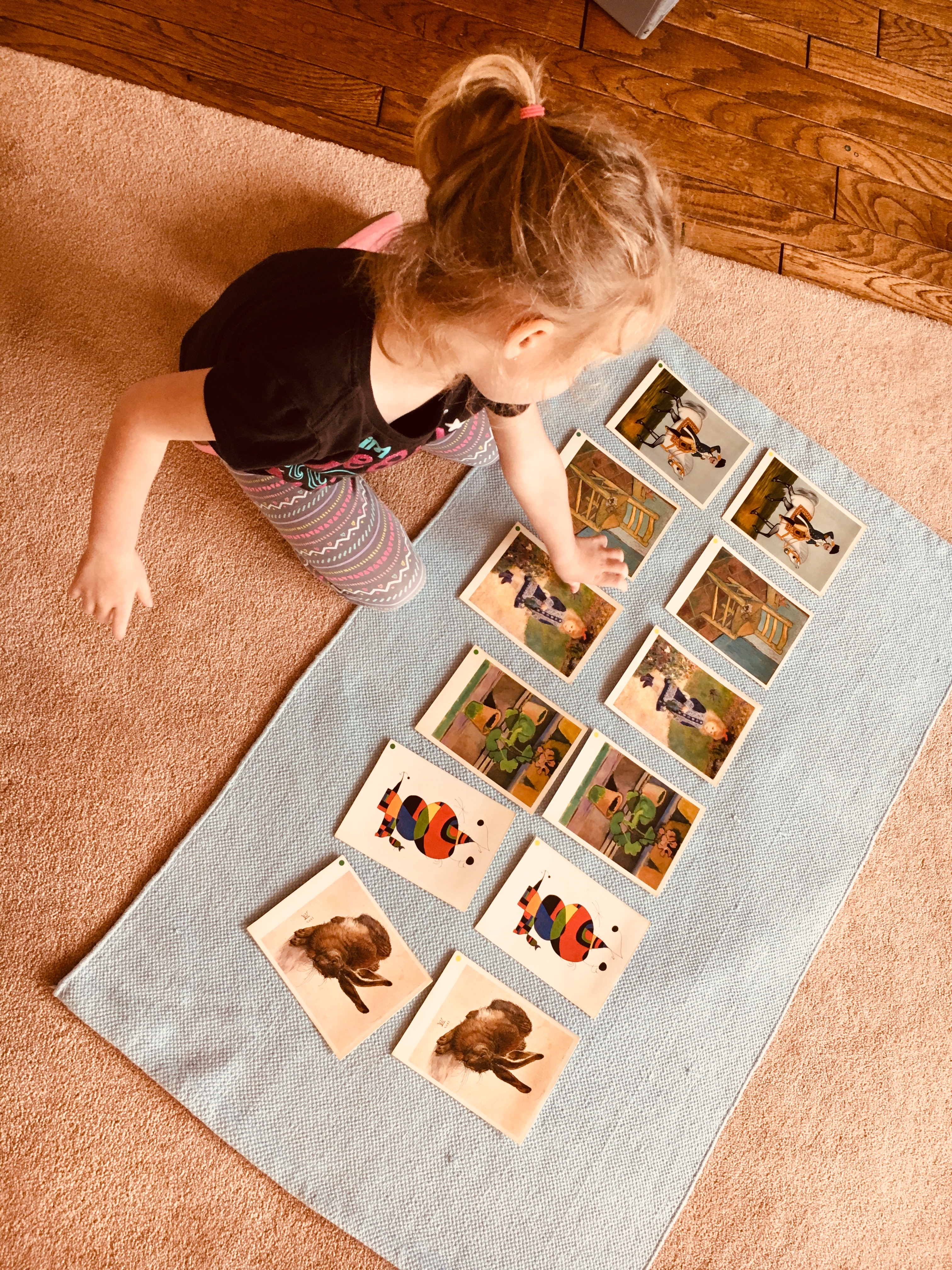 Molli, age 4, matching artwork cards.